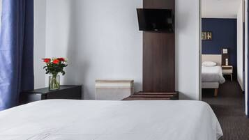 Family Room | Premium bedding, desk, laptop workspace, soundproofing