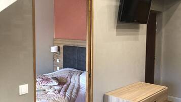 Appartement Confort | Literie de qualité supérieure, bureau, rideaux occultants
