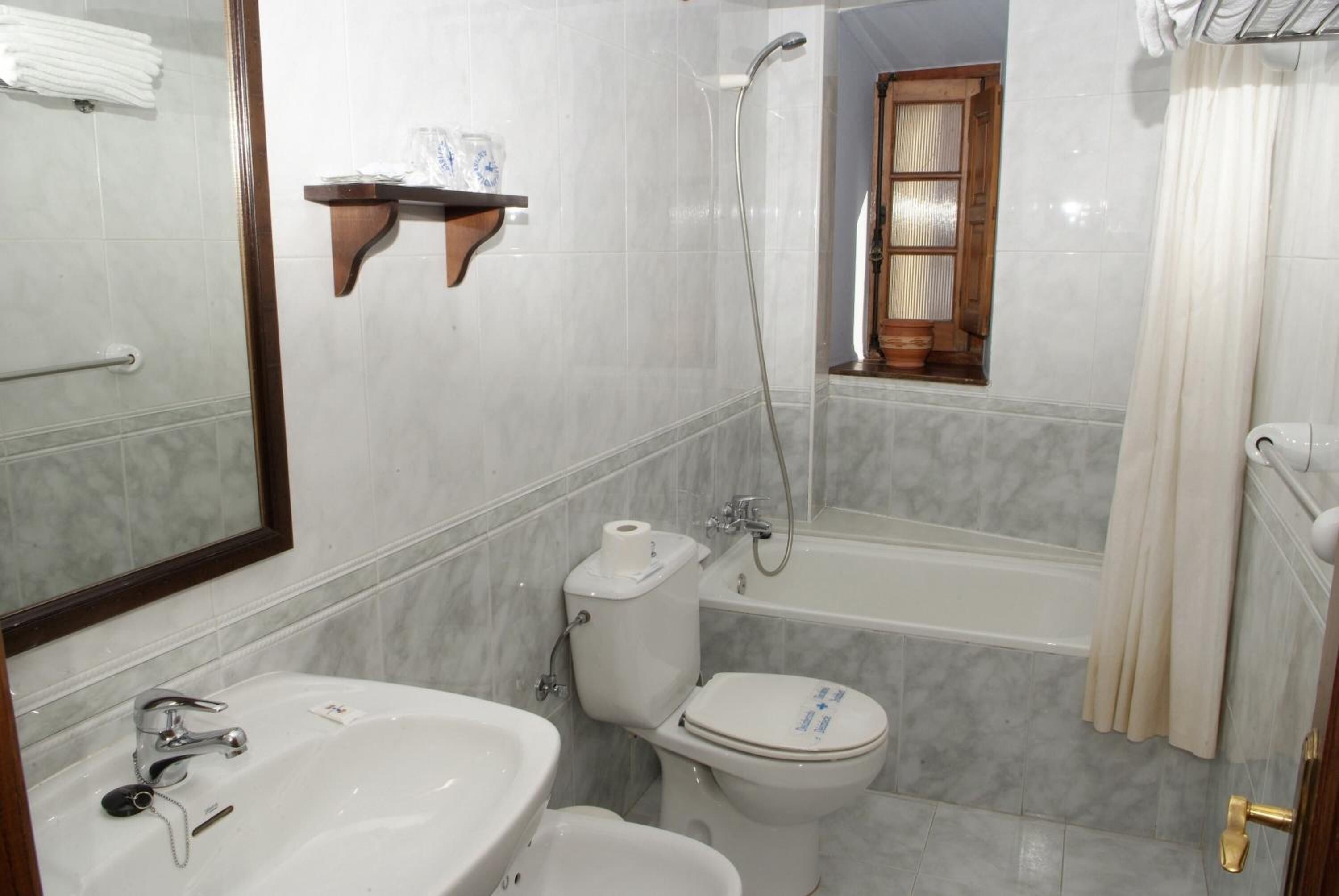 deep-soaking bathtub, free toiletries, hair dryer, bidet