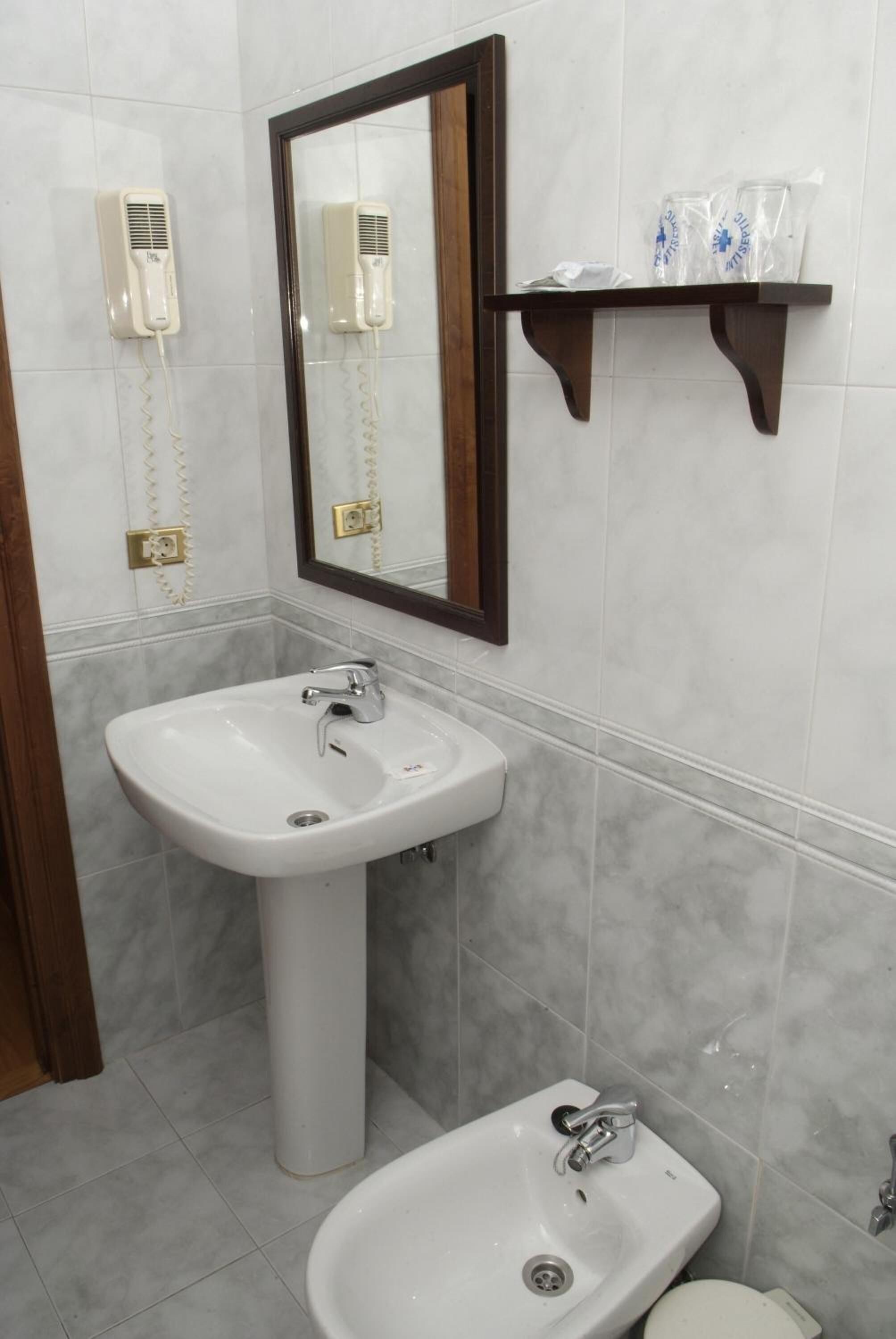 deep-soaking bathtub, free toiletries, hair dryer, bidet