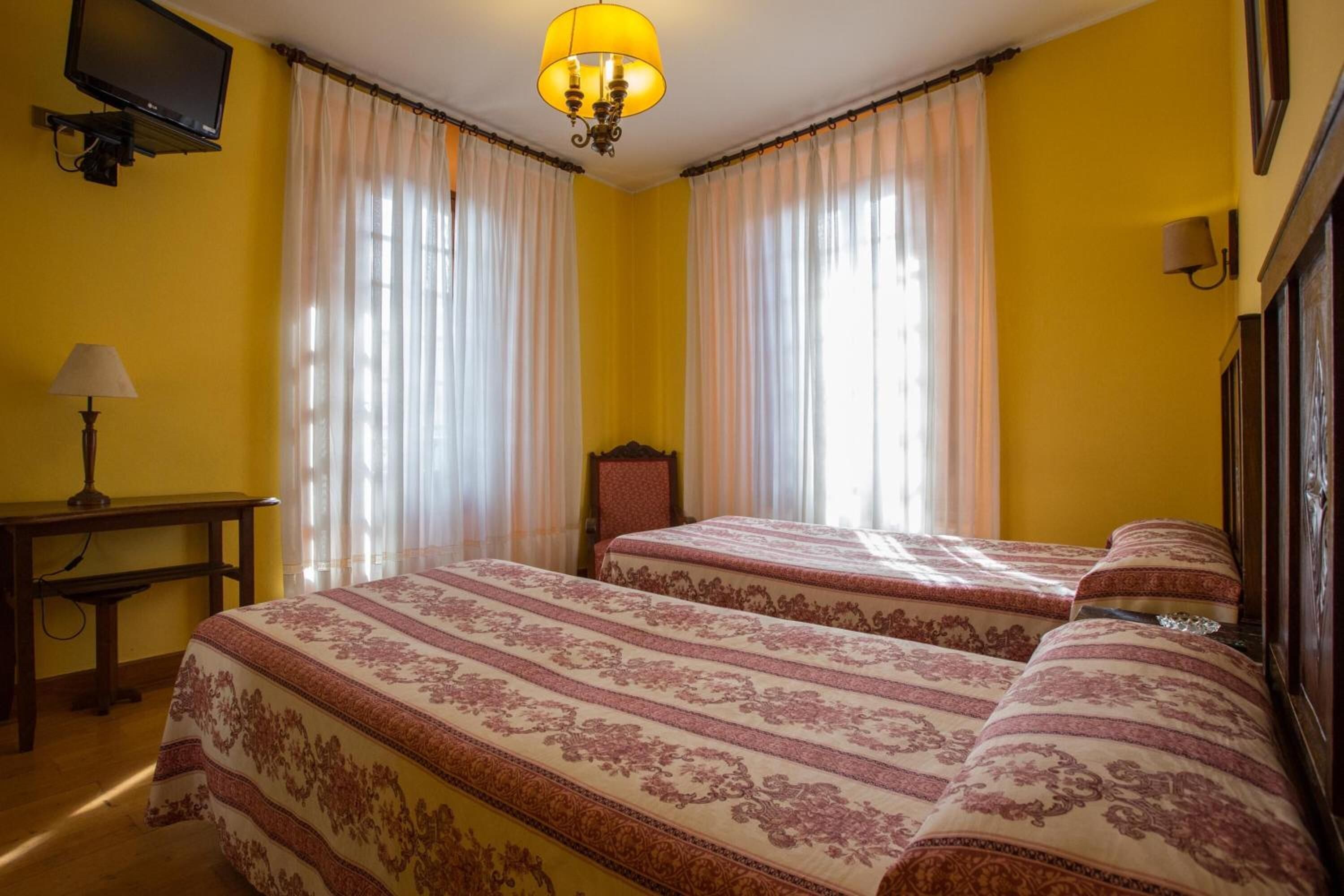 premium bedding, minibar, desk, cots/infant beds