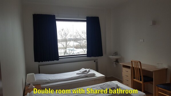 Twin Room, Shared Bathroom | Pillow-top beds, free WiFi, bed sheets - Travel Inn Guesthouse (Reykjavik)