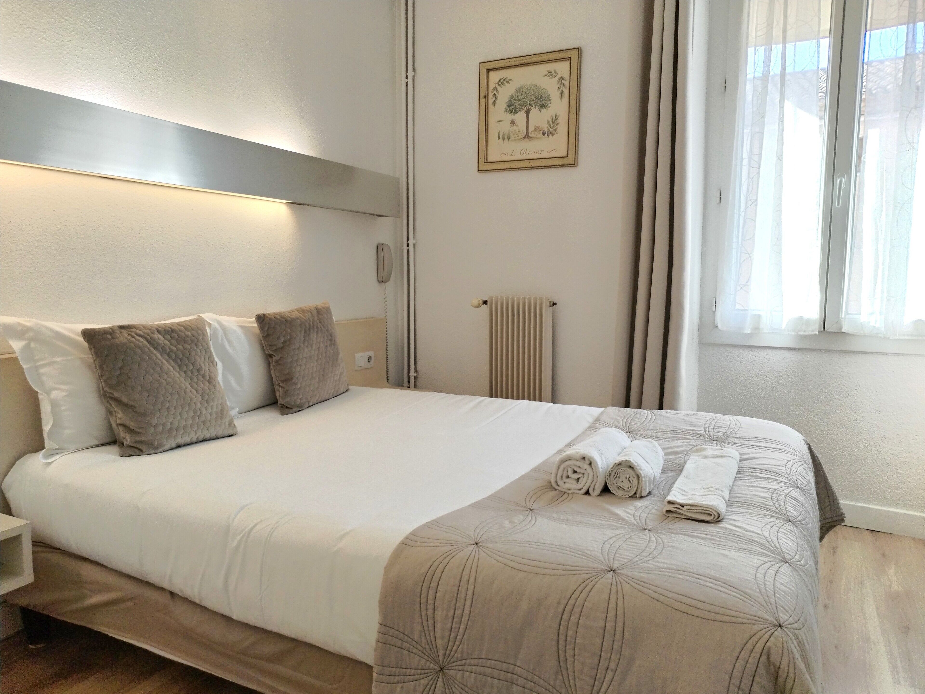 Kamar Double Klasik | Wi-Fi gratis dan seprai linen