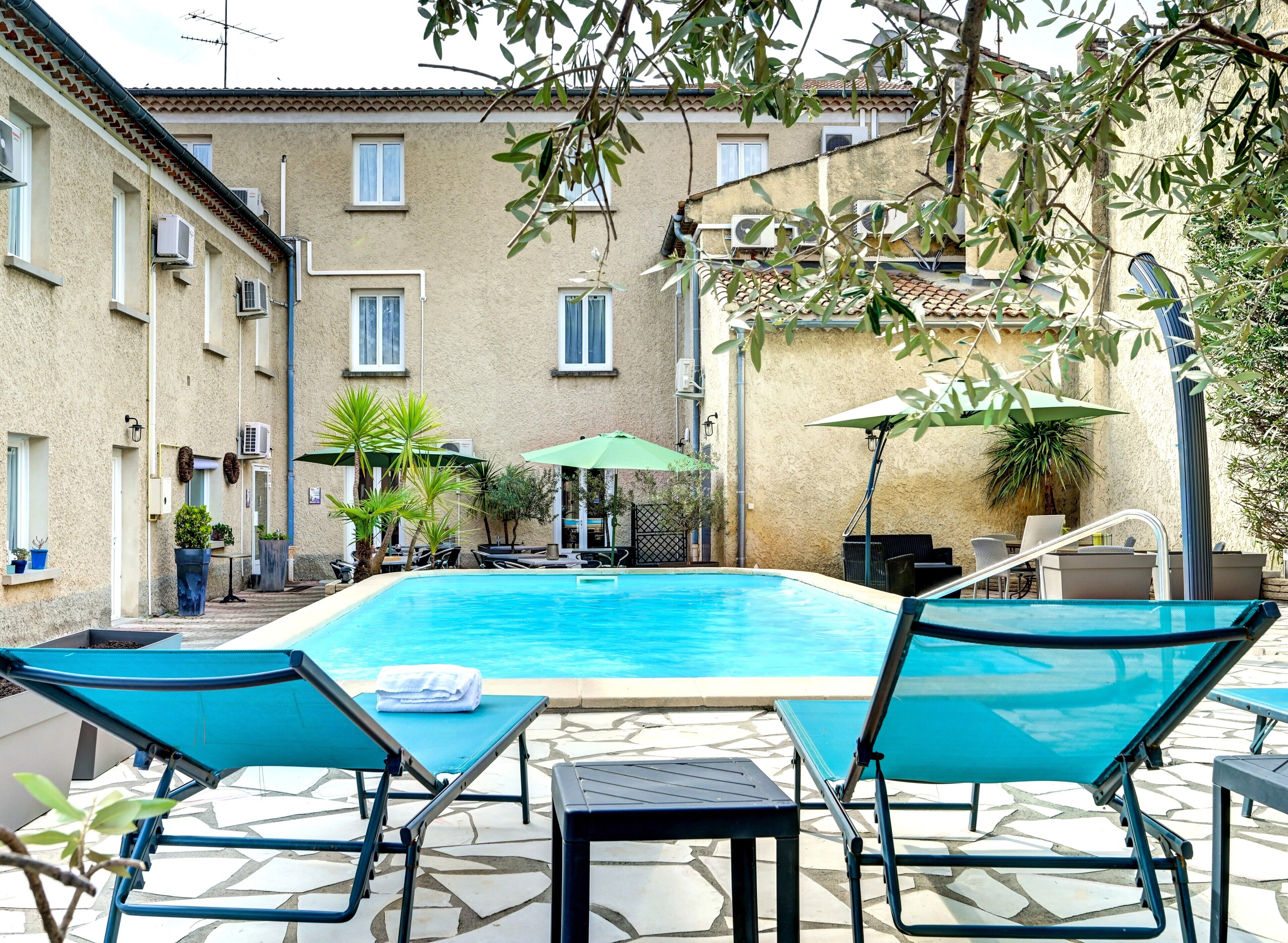 Seasonal outdoor pool, open 9:00 AM to 8:00 PM, sun loungers