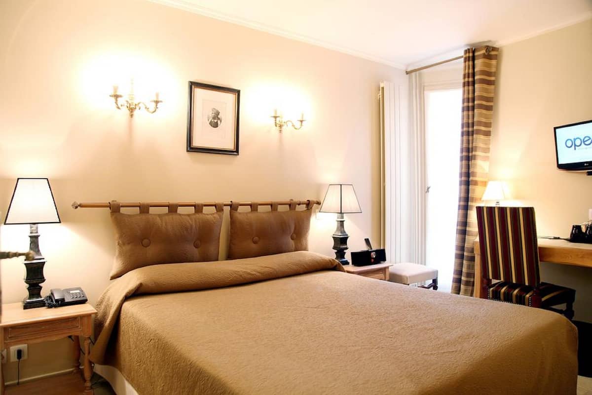 Standard Double Room | Minibar, in-room safe, desk, iron/ironing board (on request)