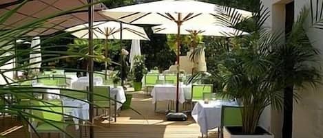 Lunch, dinner served; French cuisine, pool views