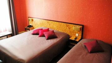 Standard Triple Room | Minibar, in-room safe, desk, iron/ironing board