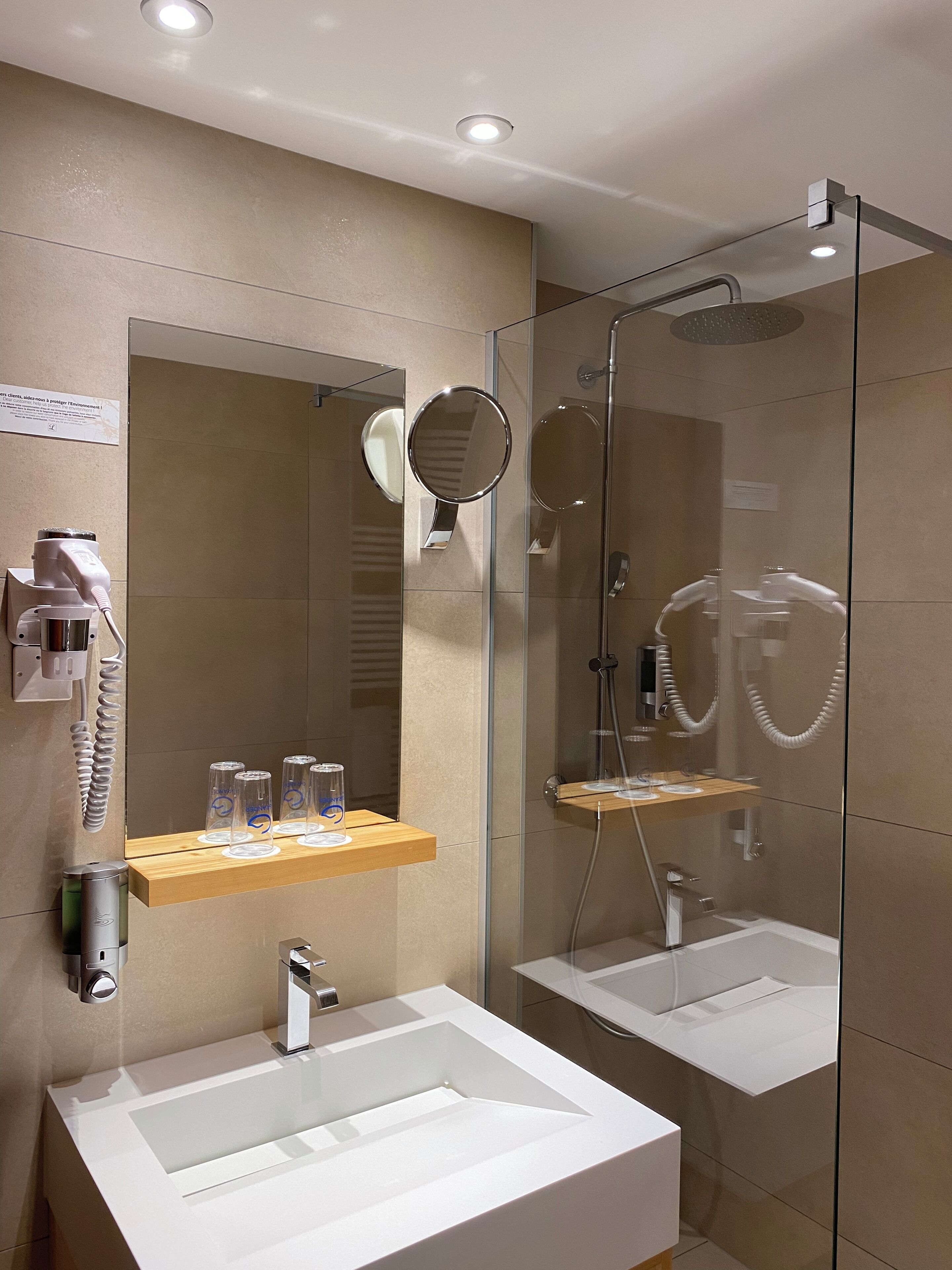 standard double room | bathroom | shower, rainfall showerhead, hair dryer, bathrobes