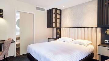 Premium bedding, pillow-top beds, minibar, in-room safe