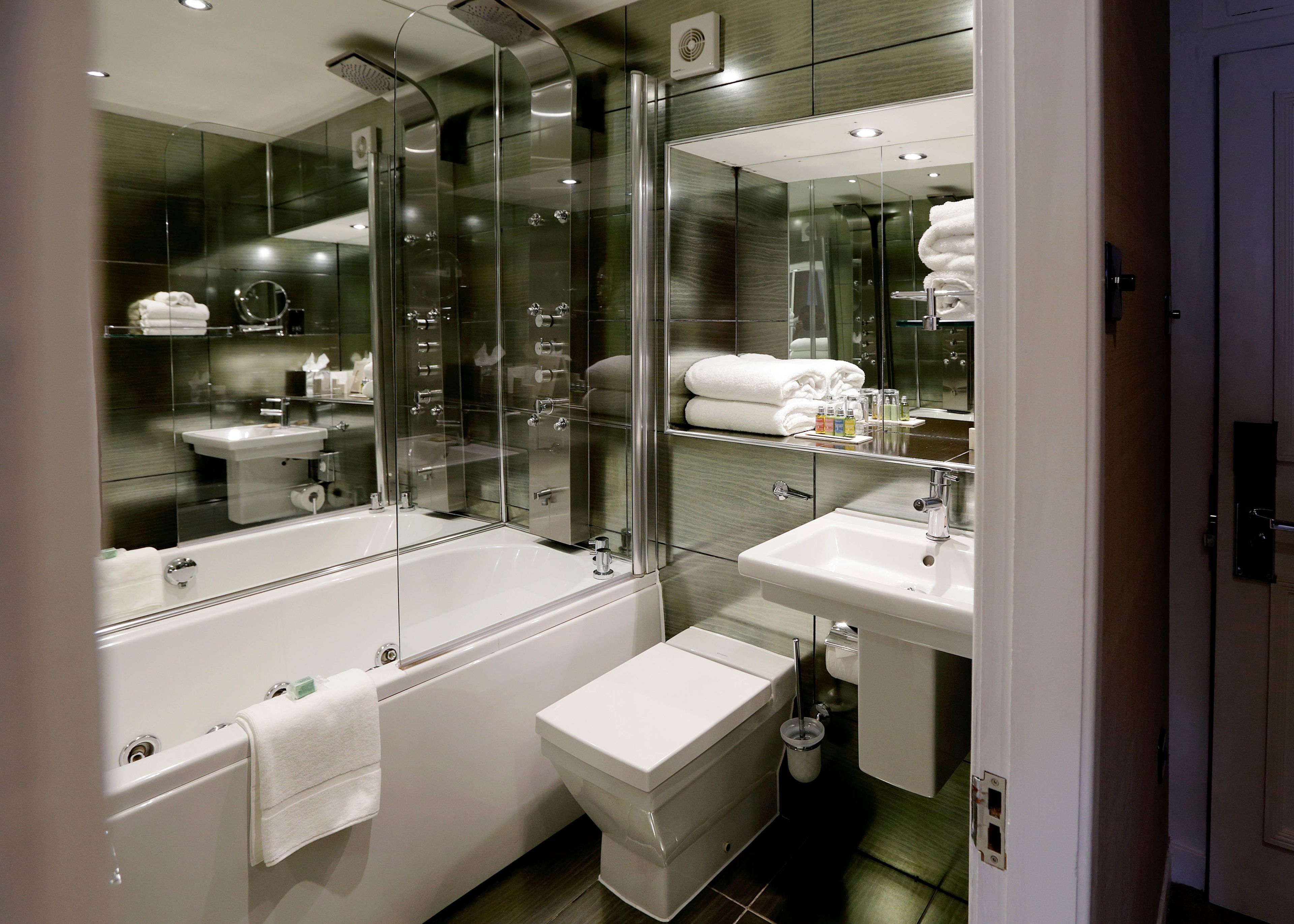 townhouse grand | bathroom | jetted bath, hydromassage showerhead, designer toiletries, hair dryer