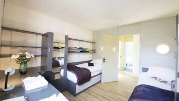 Desk, laptop workspace, free WiFi, bed sheets