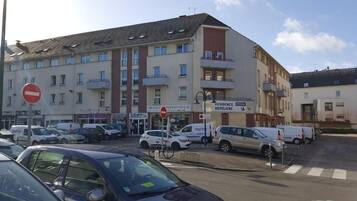 A multi-story building with a sign for 'Grossteste' and 'Residences'.