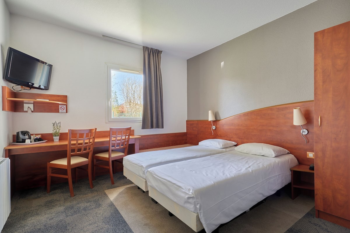 Premium bedding, desk, blackout curtains, soundproofing