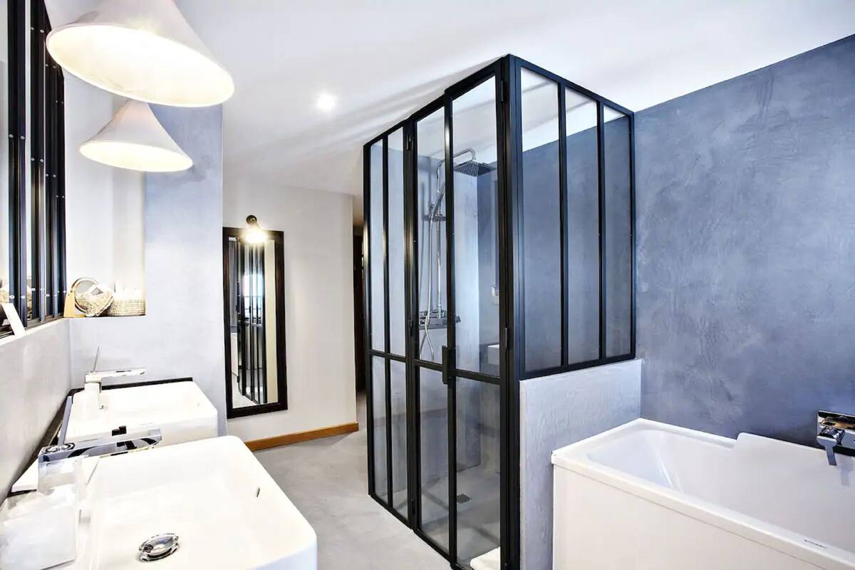 deluxe room | bathroom | designer toiletries, hair dryer, bathrobes, slippers