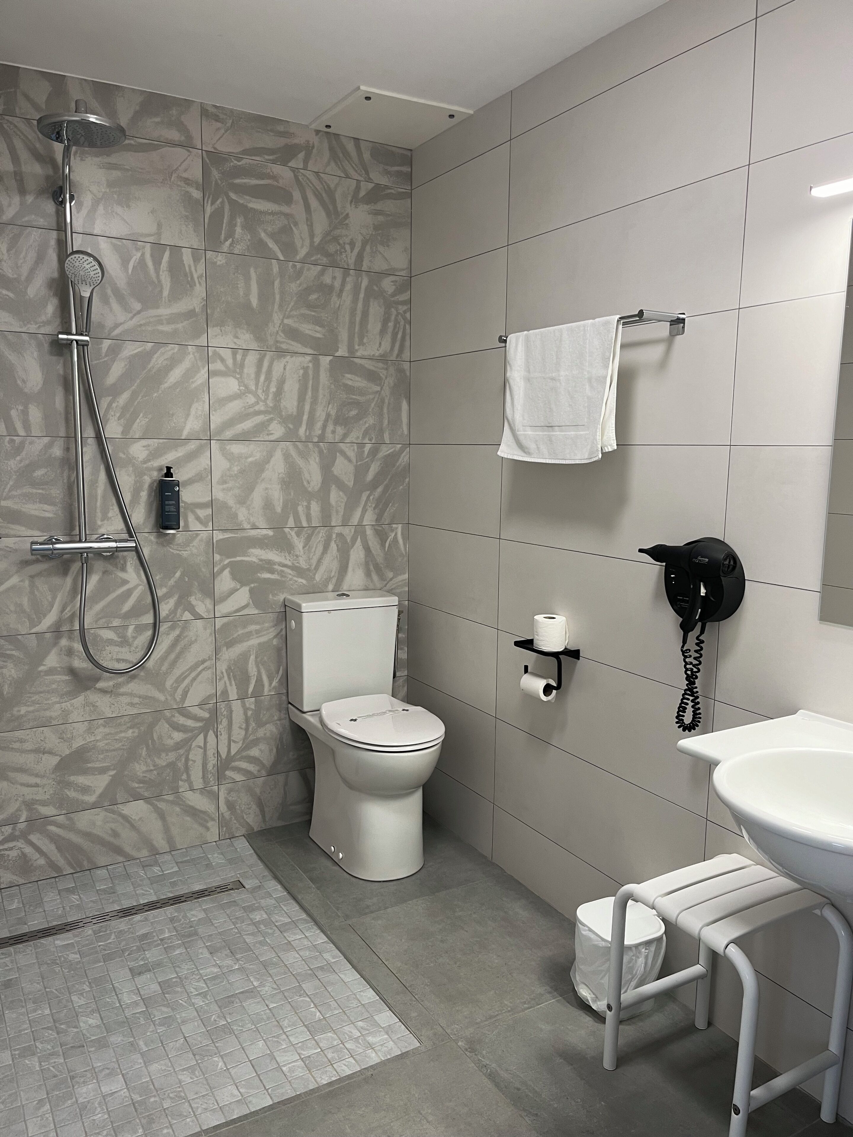 comfort triple room, accessible | bathroom | shower, free toiletries, hair dryer, towels