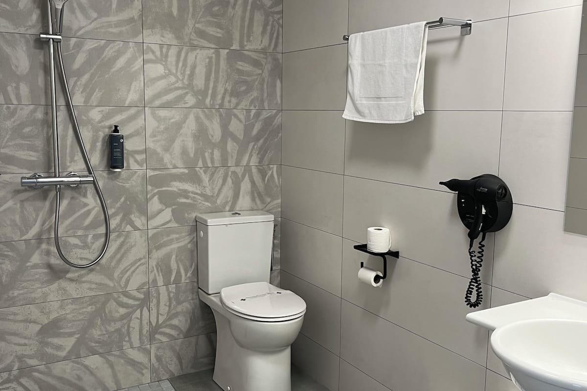 comfort triple room, accessible | bathroom | shower, free toiletries, hair dryer, towels