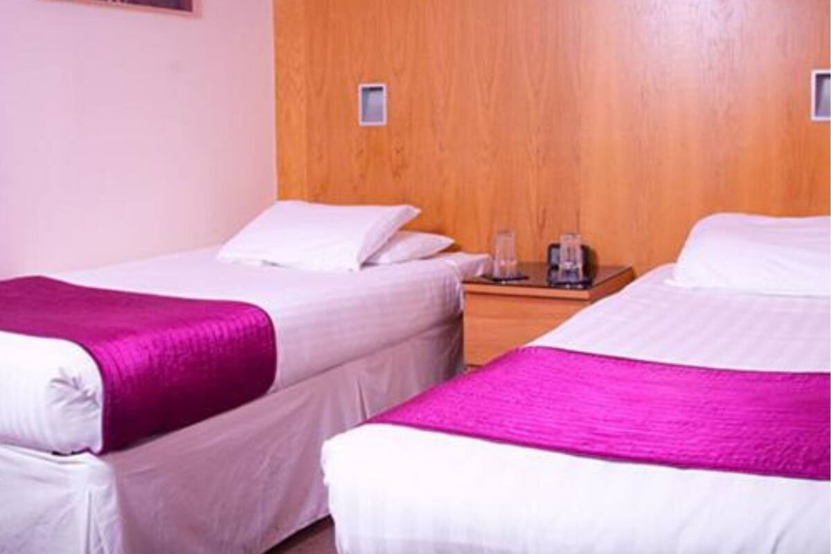 Standard Triple Room, 3 Single Beds | Desk, iron/ironing board (on request), free cots/infant beds, bed sheets