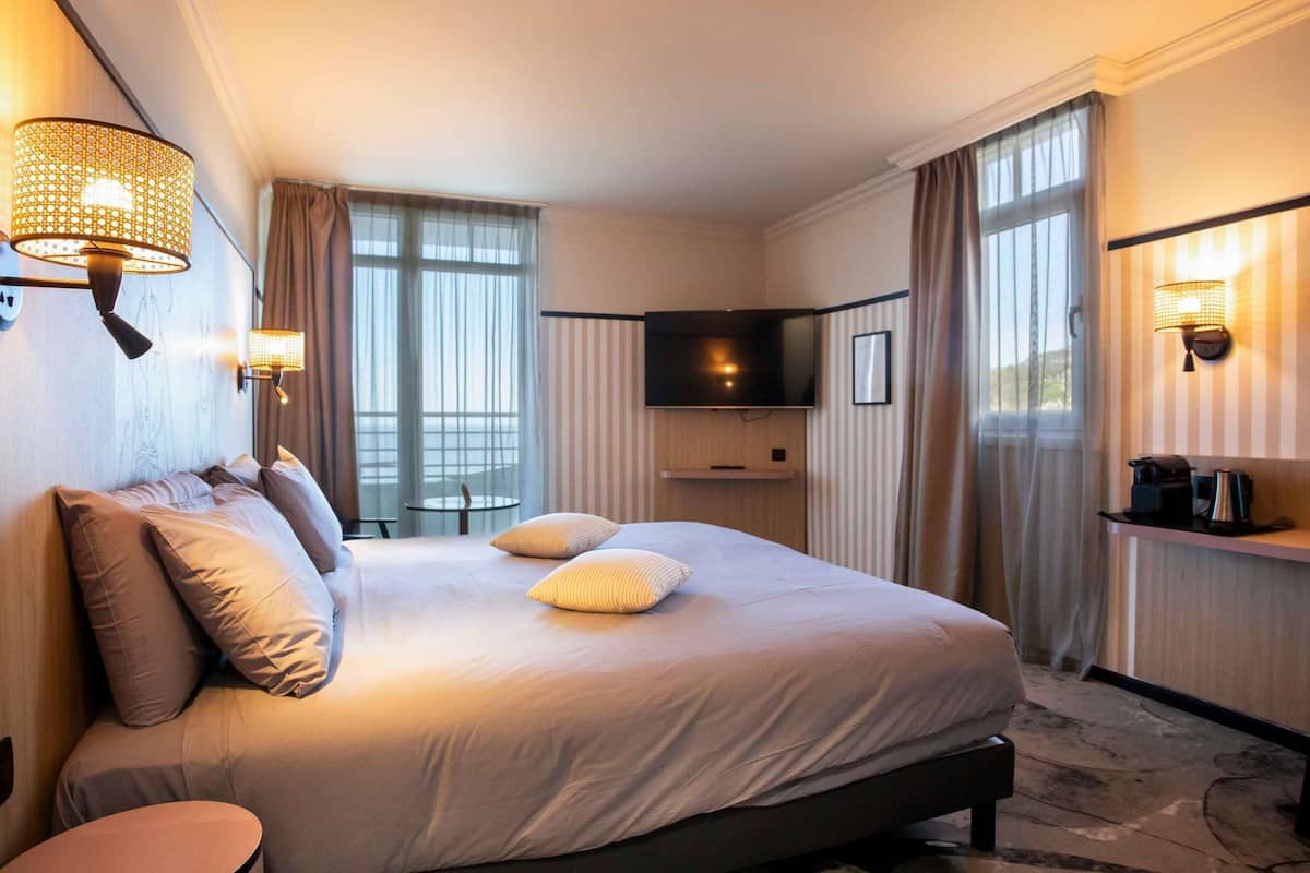 Ropa de cama de alta calidad y minibar