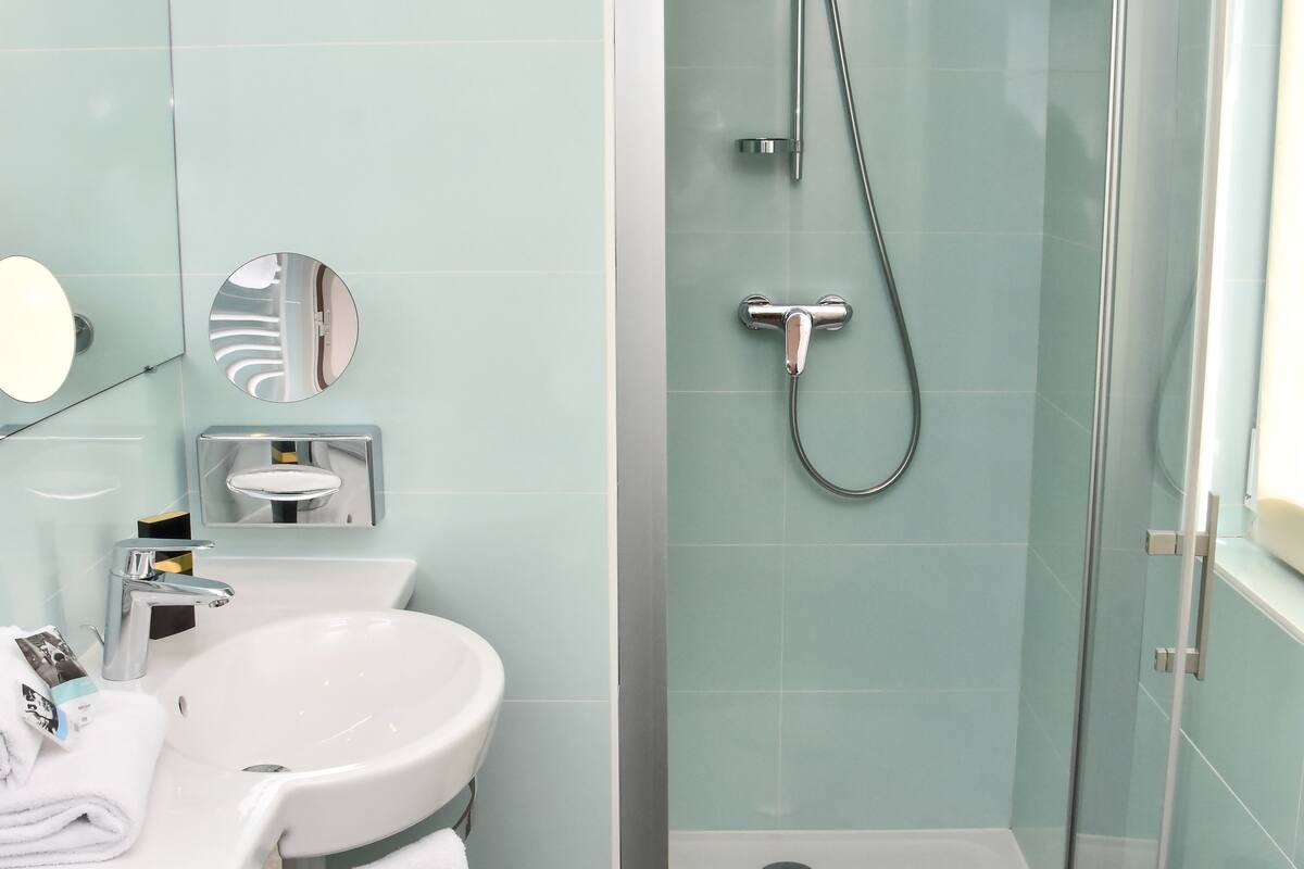 shower, rainfall showerhead, eco-friendly toiletries, hair dryer