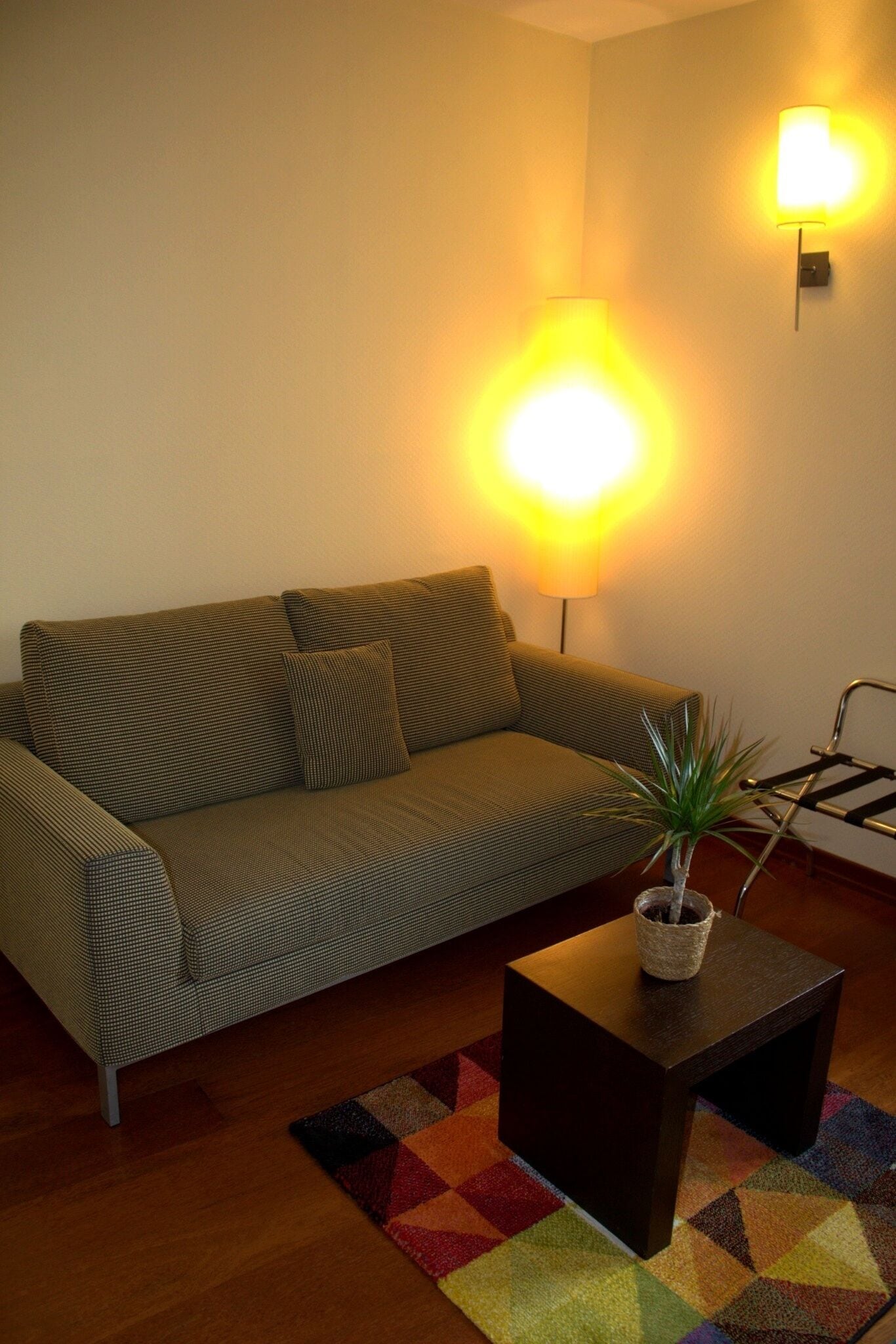 Family Duplex Suite | Living area | 22-inch TV with cable channels