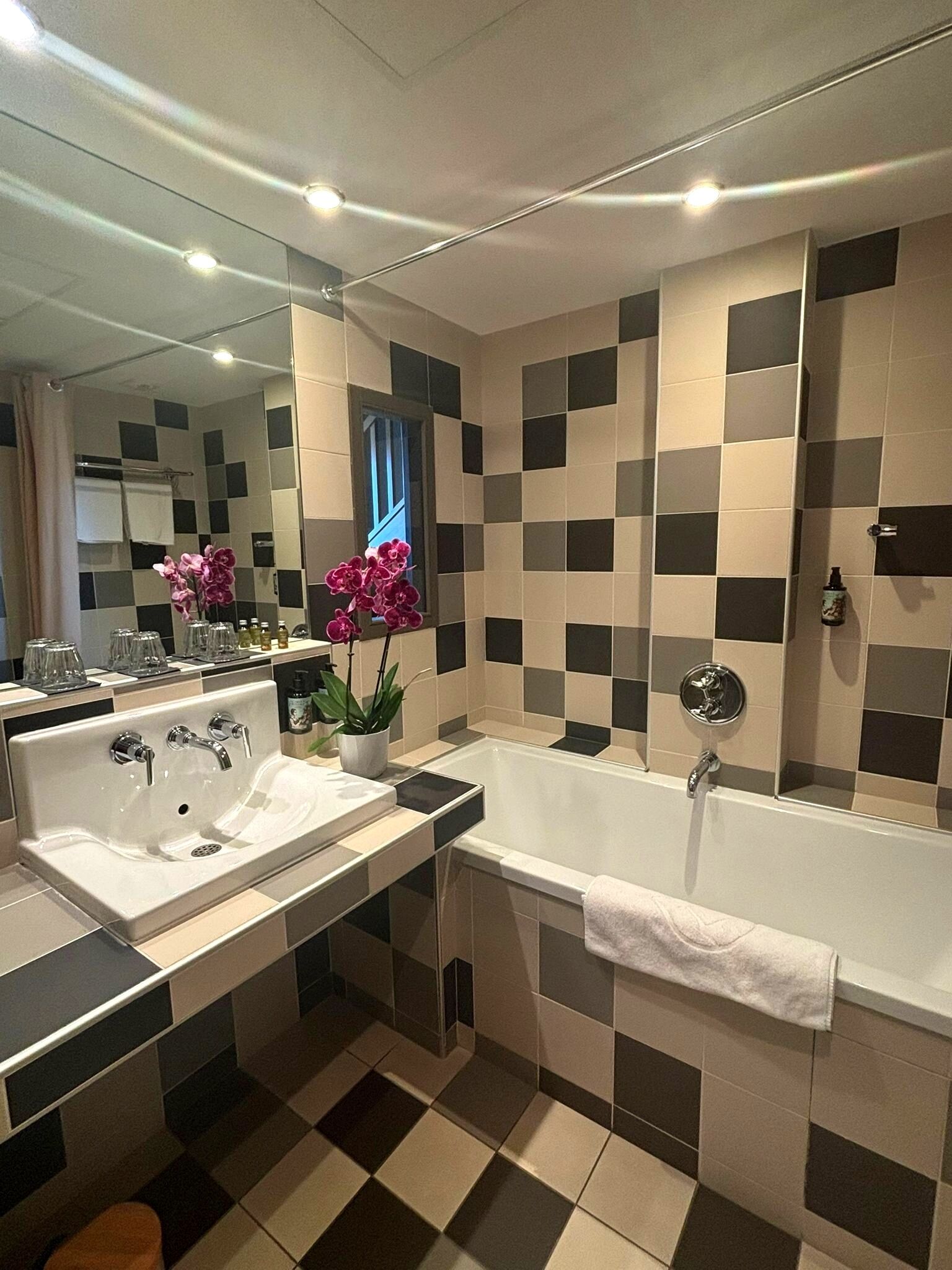 family duplex suite | bathroom | hair dryer, slippers, towels