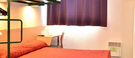 A bunk bed with a desk and chair, a window with purple curtains, and a wall-mounted TV.