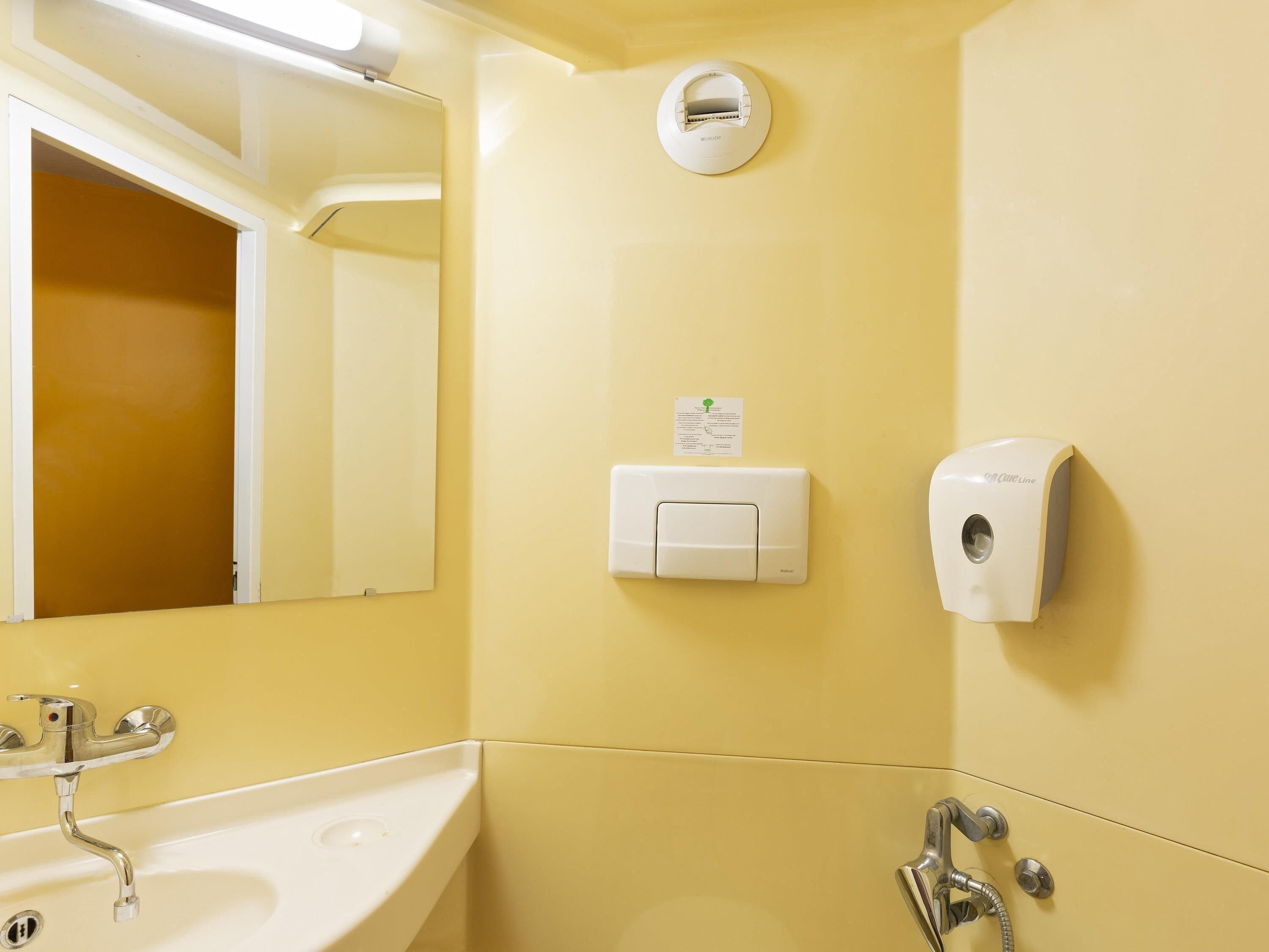 Shower, eco-friendly toiletries, towels, soap