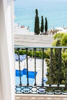 Studio, Sea View | Down comforters, in-room safe, desk, laptop workspace