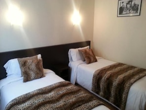 Premium bedding, desk, iron/ironing board, free WiFi