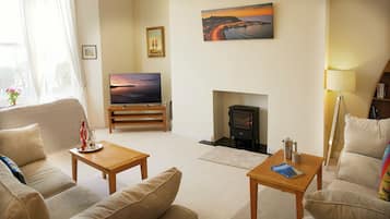 Luxury Apartment | Living area | LCD TV, DVD player