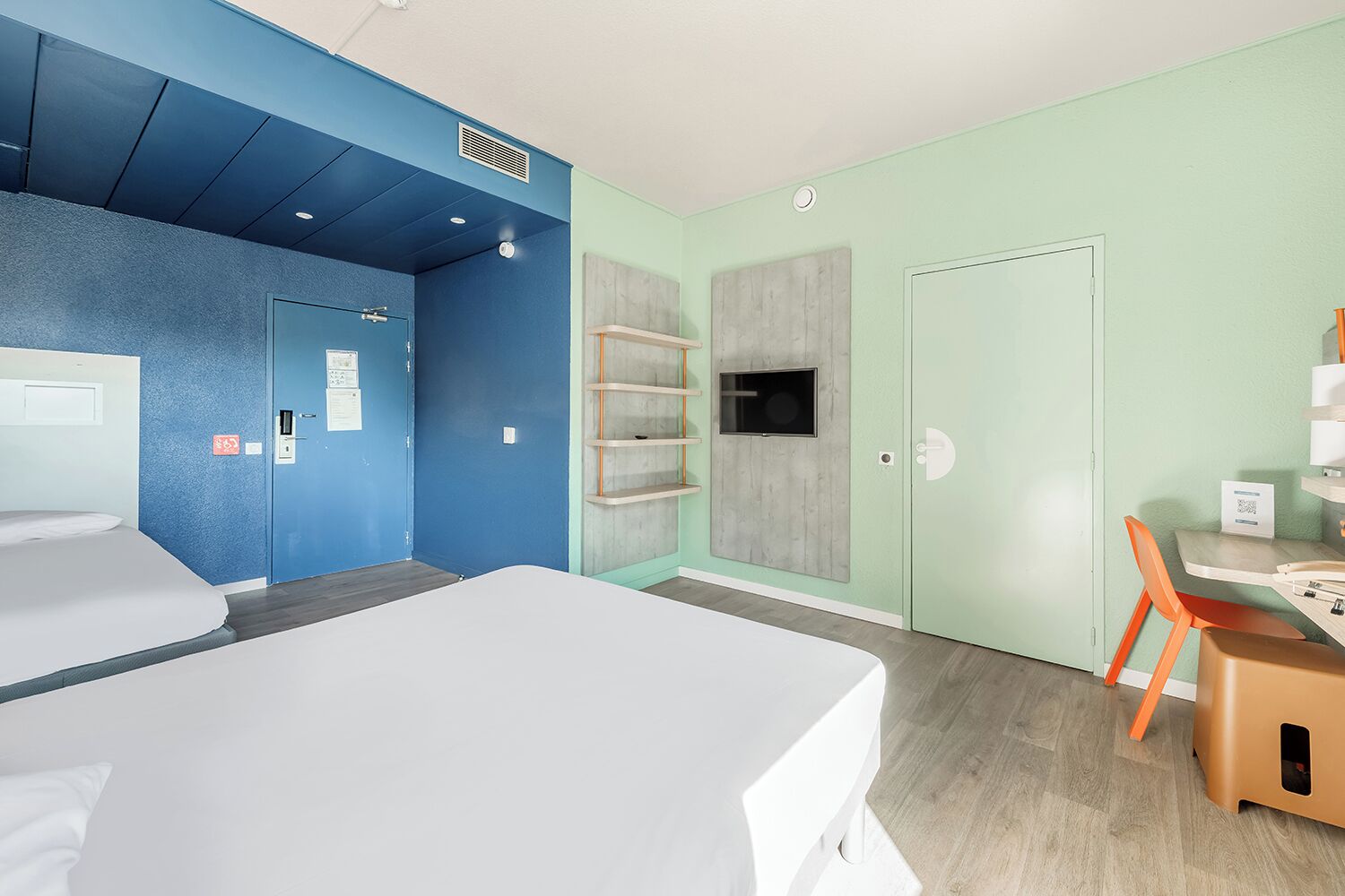 Desk, blackout curtains, soundproofing, free cots/infant beds