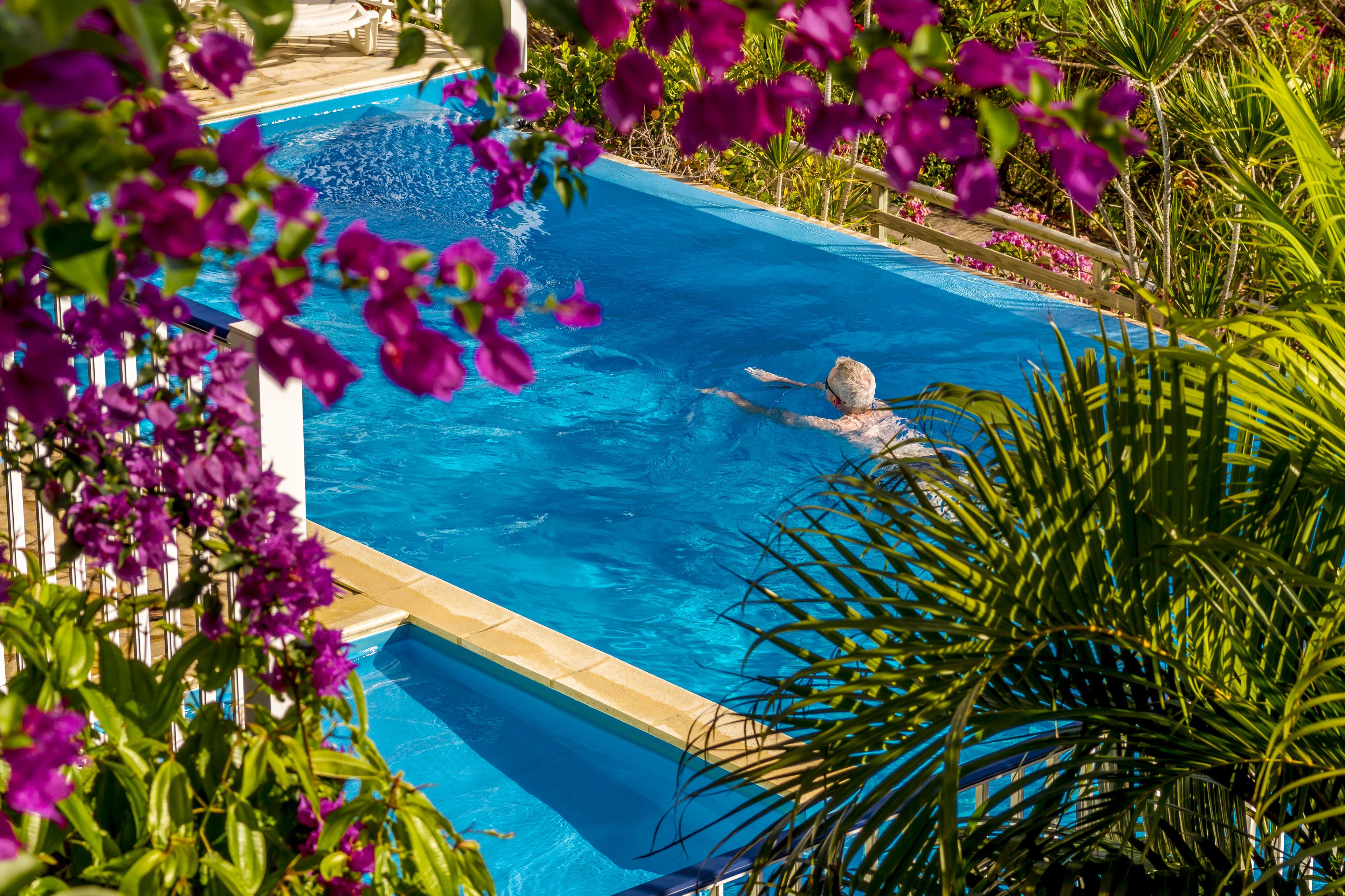 outdoor pool, pool umbrellas, pool loungers