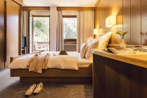 Couette en duvet d'oie, coffres-forts dans les chambres, bureau