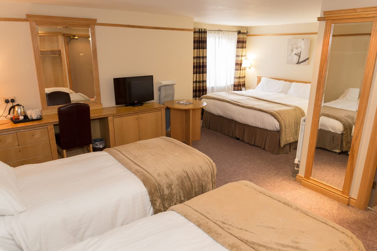 Family Room | Premium bedding, desk, laptop workspace, iron/ironing board (on request)