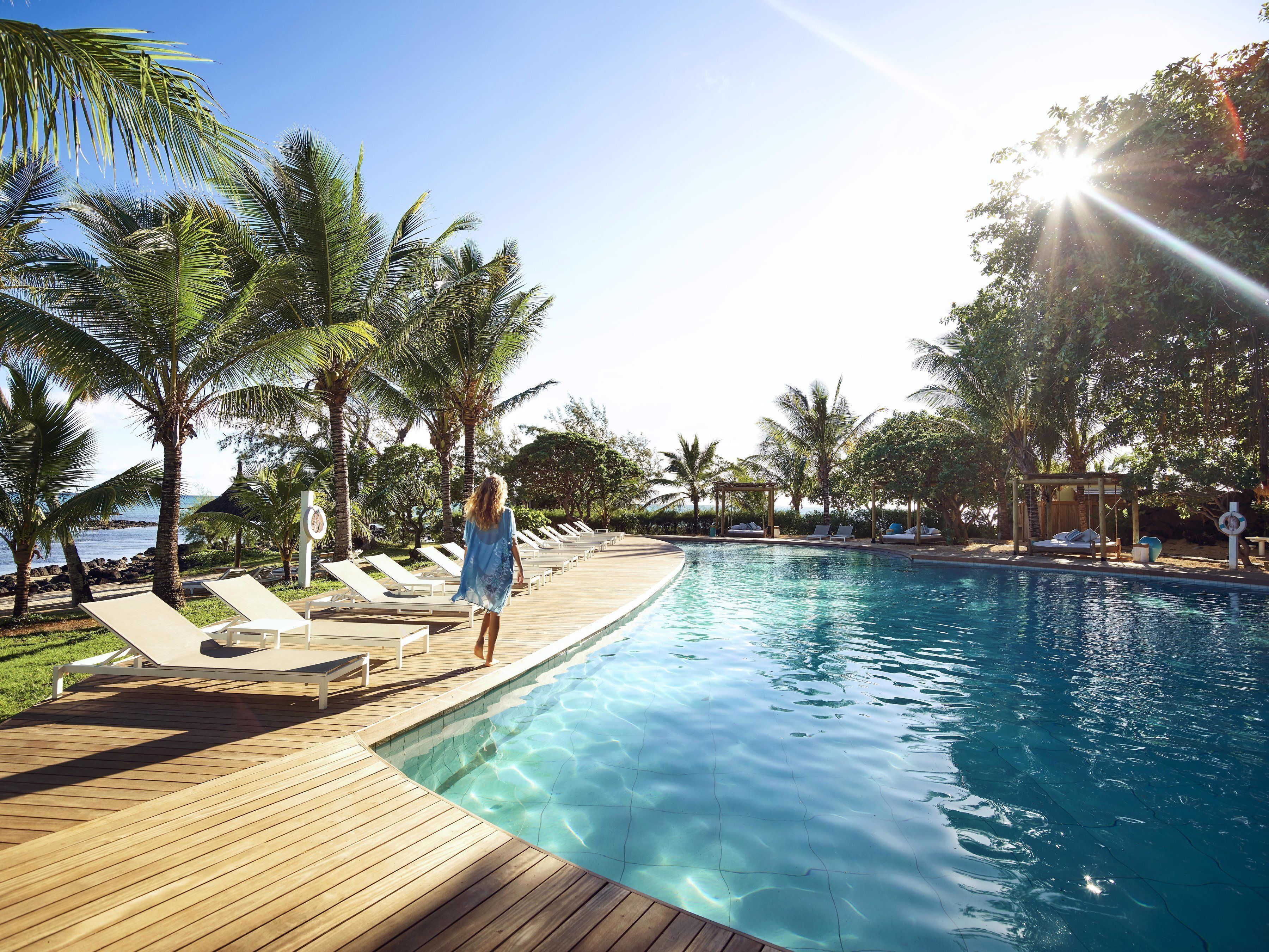 2 outdoor pools, pool umbrellas, pool loungers