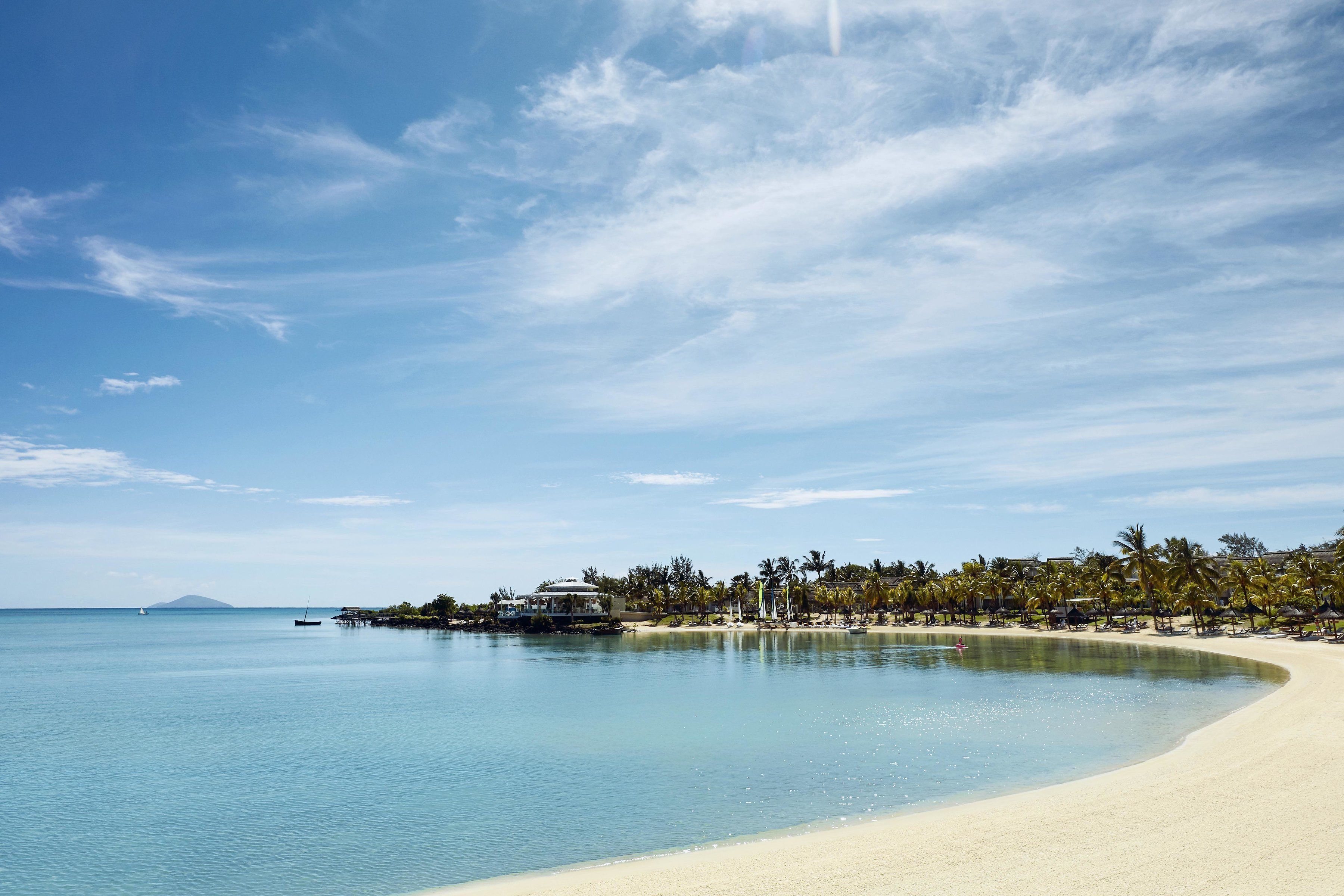 On the beach, sun loungers, beach umbrellas, beach towels