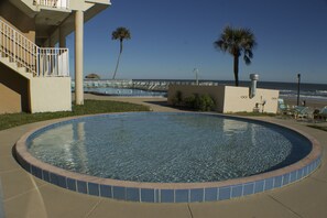 2 outdoor pools, open 9 AM to 8:00 PM, pool loungers - Makai Beach Lodge (Ormond Beach)