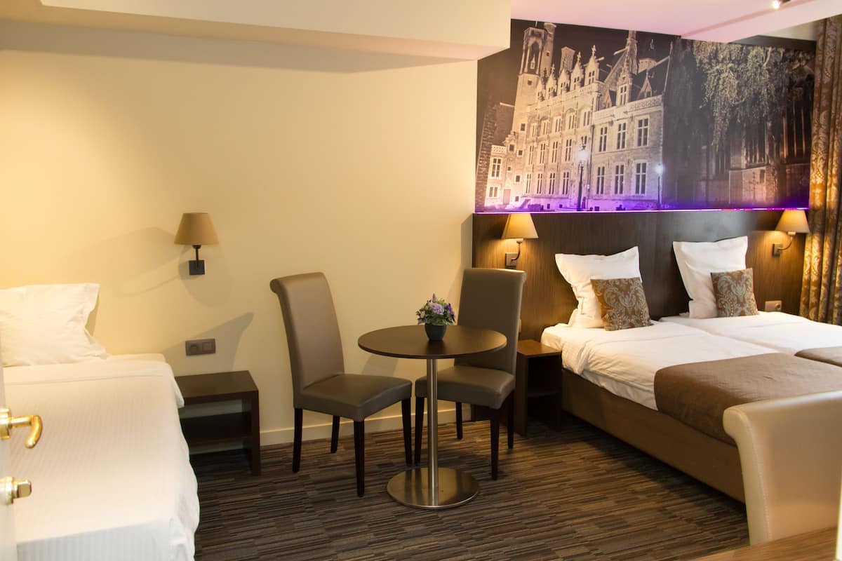 Triple Room | 1 bedroom, in-room safe, individually decorated, individually furnished