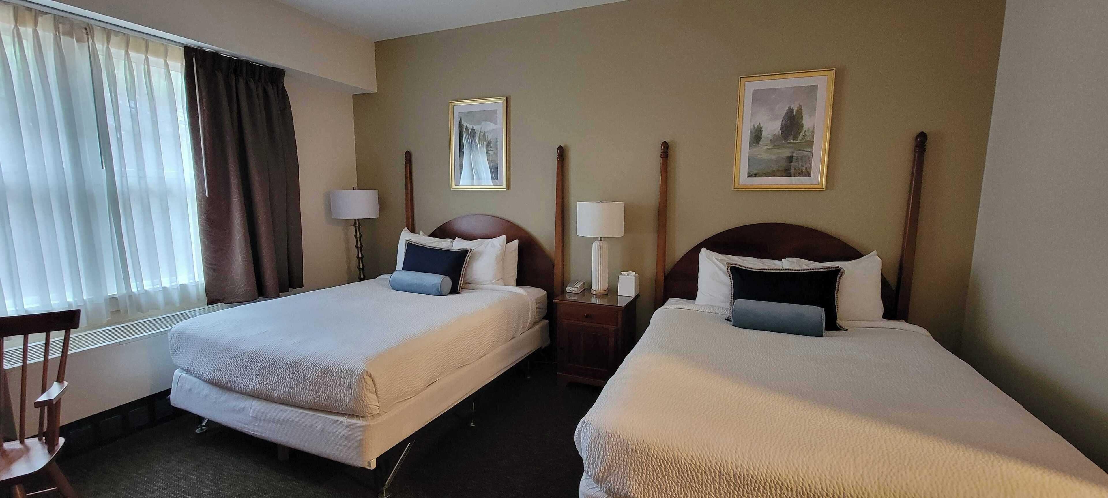 room, 2 queen beds | 1 bedroom, in-room safe, desk, blackout curtains