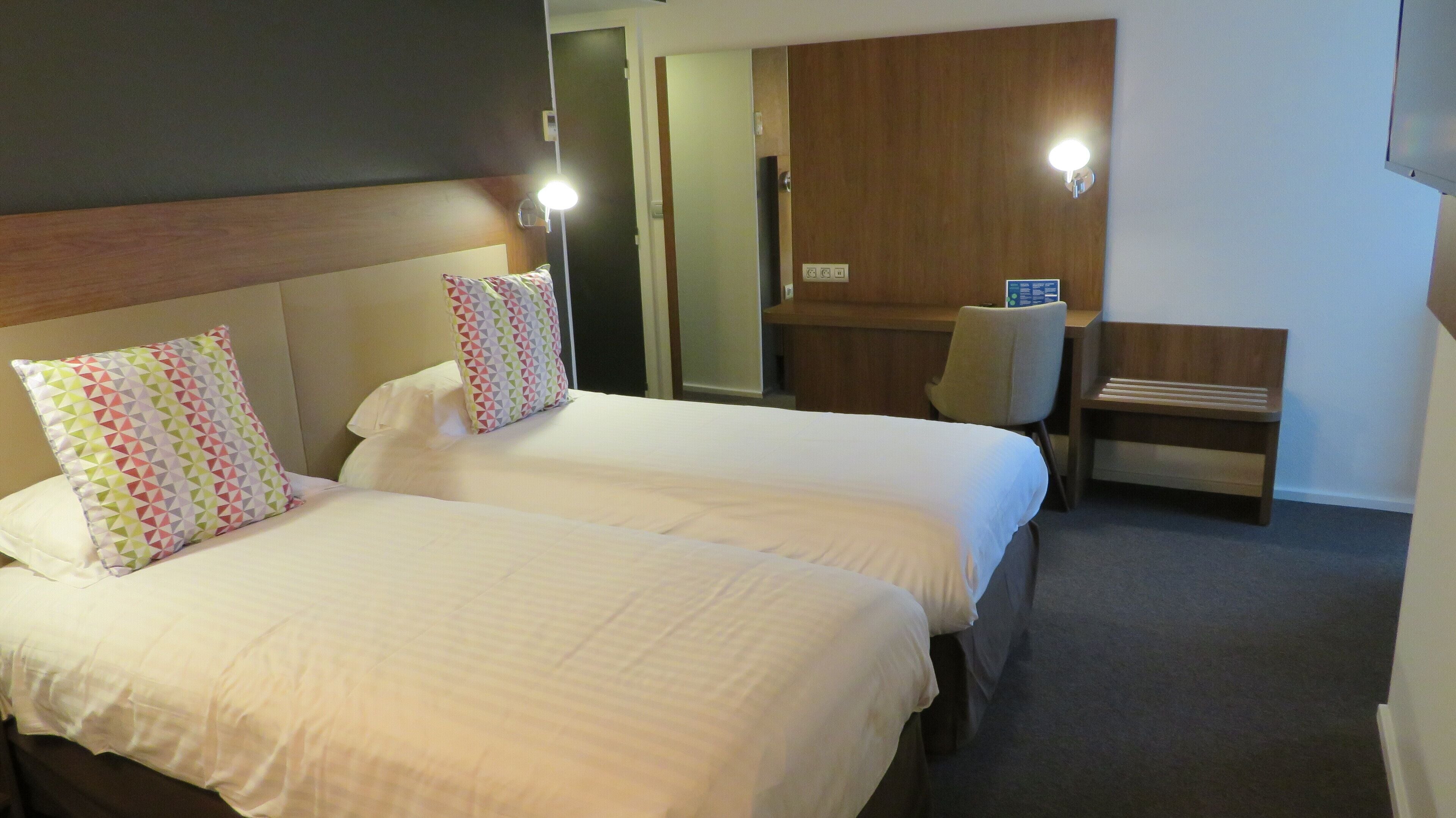 premium bedding, desk, laptop workspace, blackout curtains