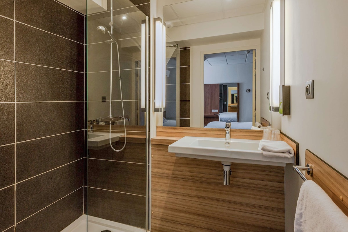 shower, eco-friendly toiletries, hair dryer, towels