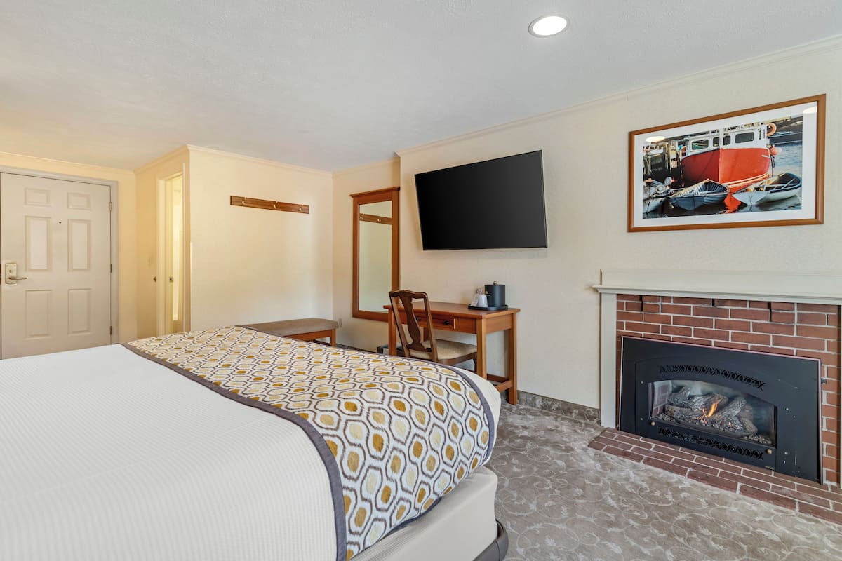 Suite, 1 King Bed, Fireplace (West) | Individually decorated, individually furnished, desk, iron/ironing board