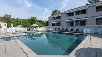 Indoor pool, seasonal outdoor pool, pool umbrellas, pool loungers