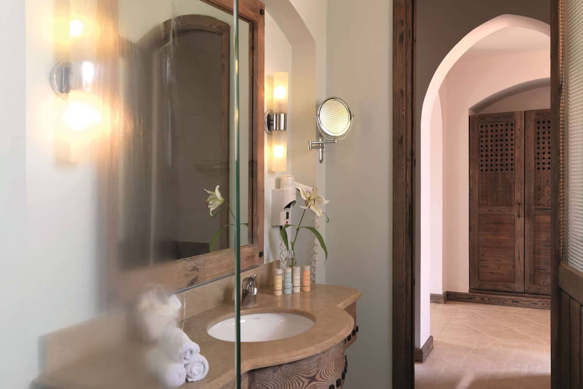 shower, eco-friendly toiletries, hair dryer, towels