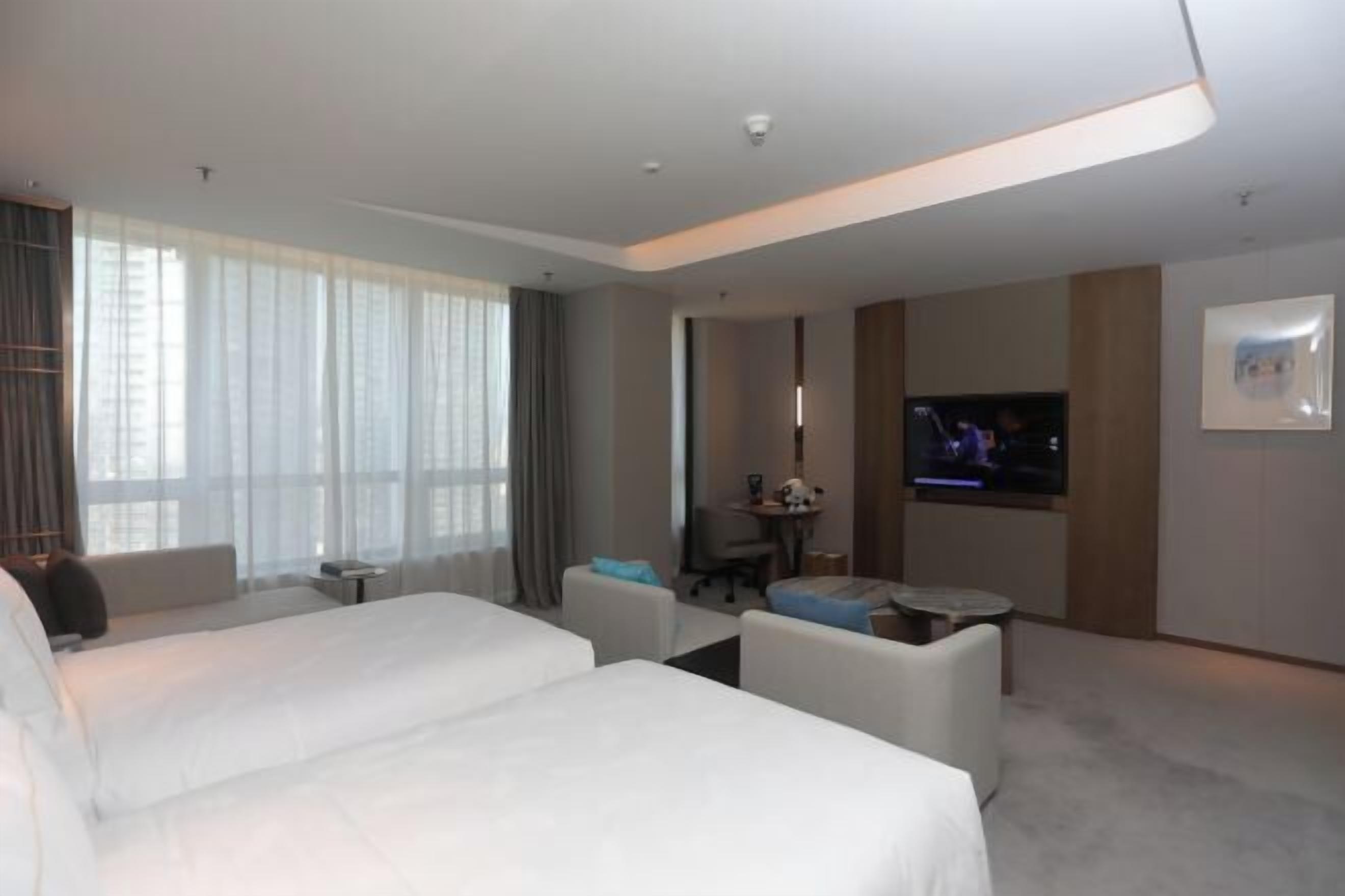 Ropa de cama de alta calidad, edredón y minibar 