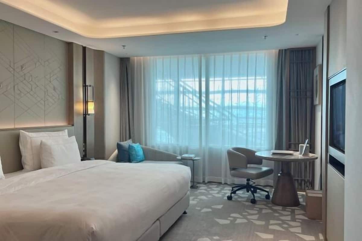1 Schlafzimmer, hochwertige Bettwaren, Daunenbettdecken, Minibar