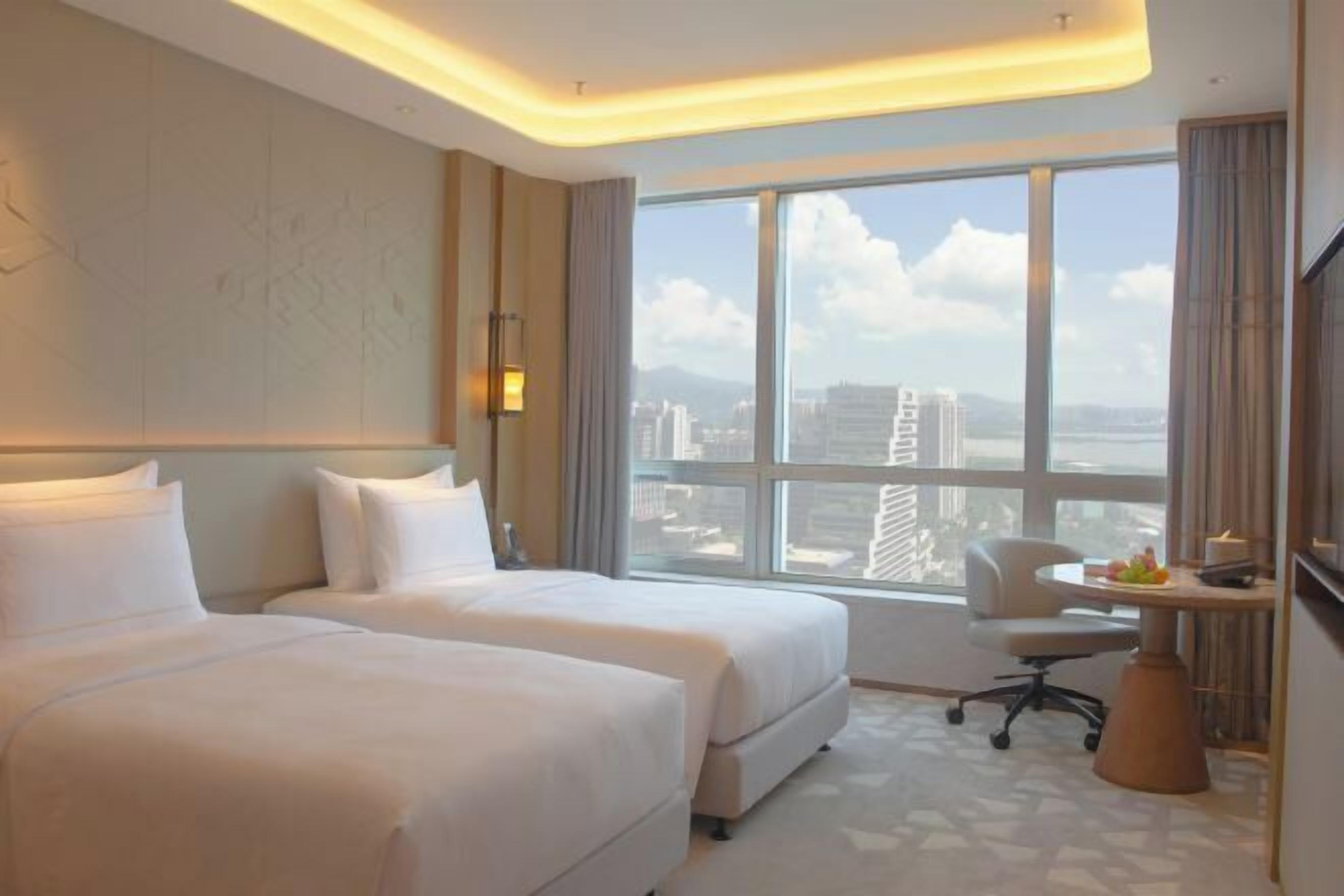 Ropa de cama de alta calidad, edredón y minibar 