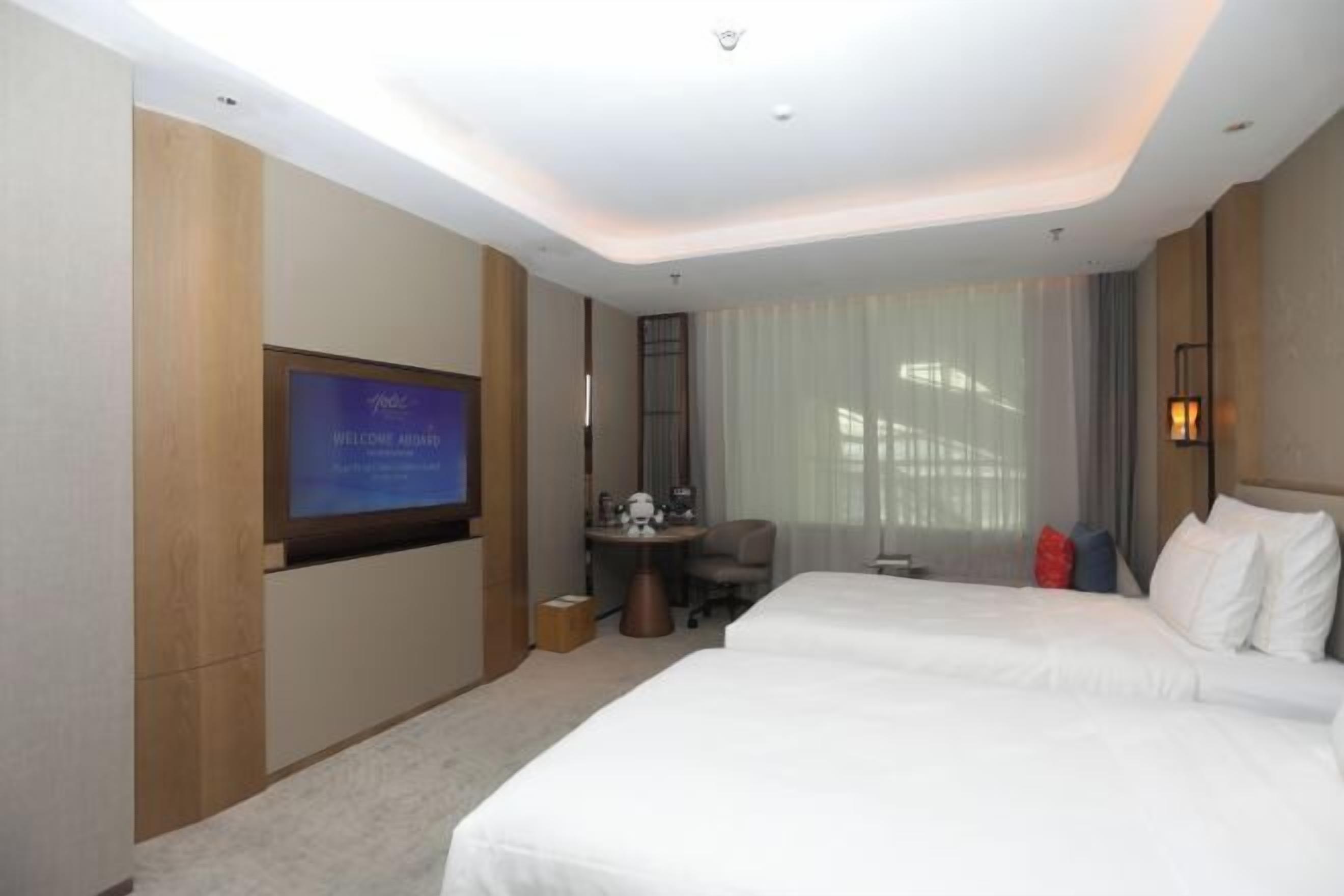 Ropa de cama de alta calidad, edredón y minibar 