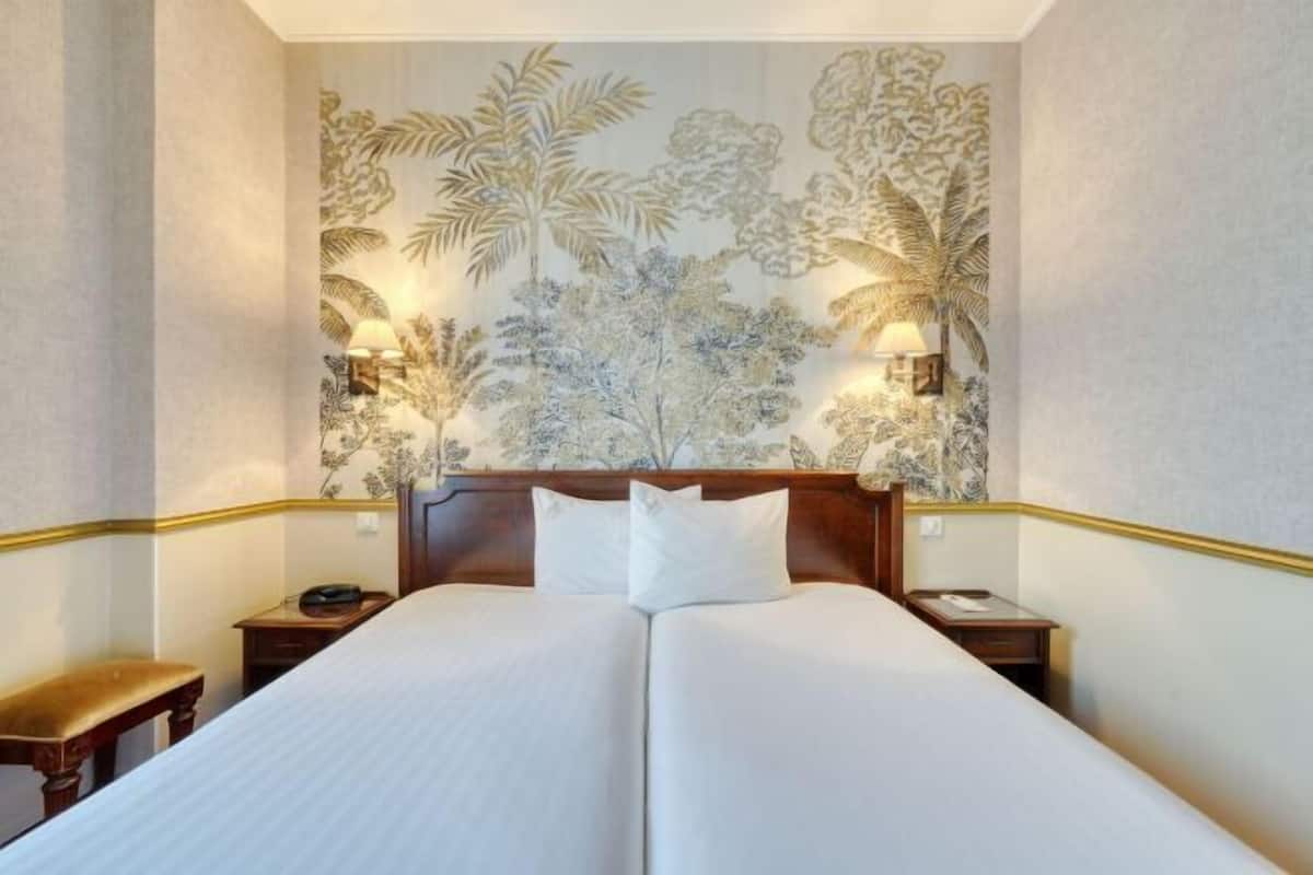 Ropa de cama de alta calidad y minibar