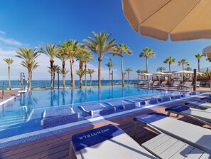 3 outdoor pools, pool umbrellas, sun loungers